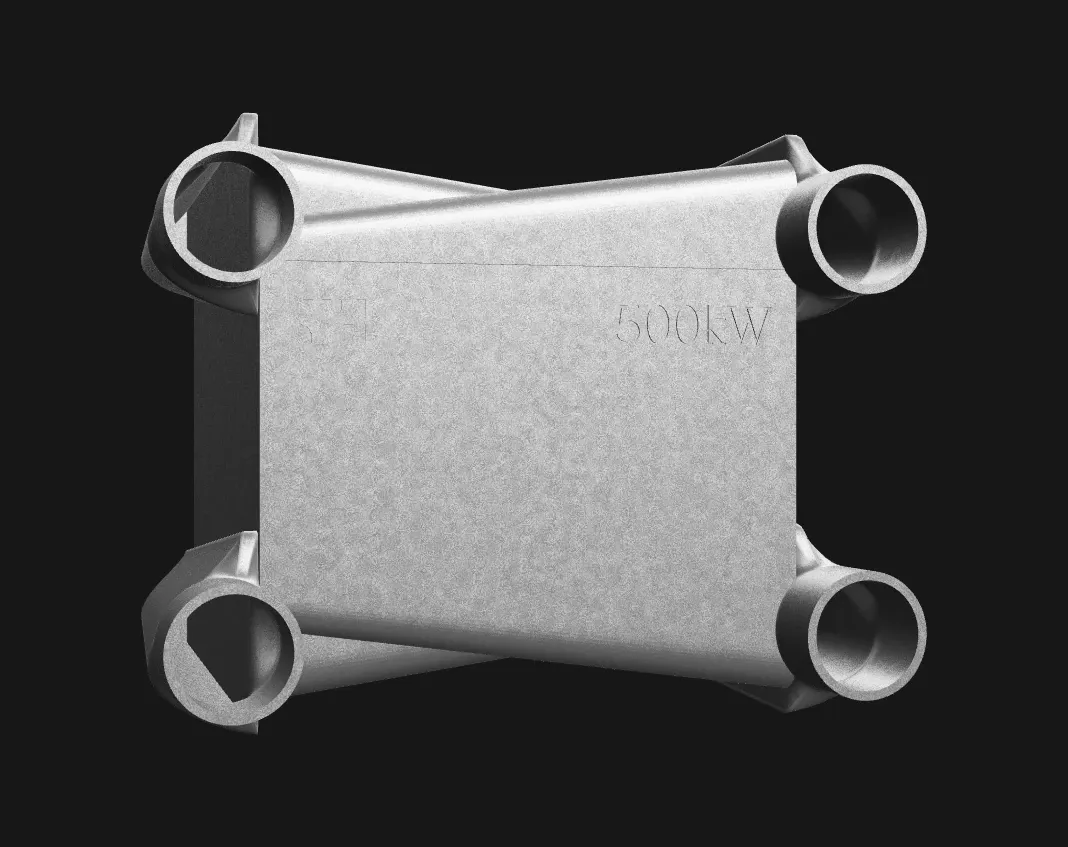 The printed exchanger in bare metal, one piece with four ports.
